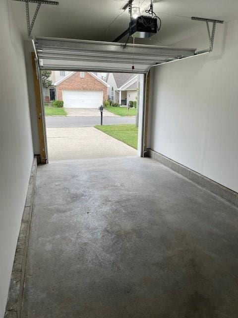 garage featuring a garage door opener