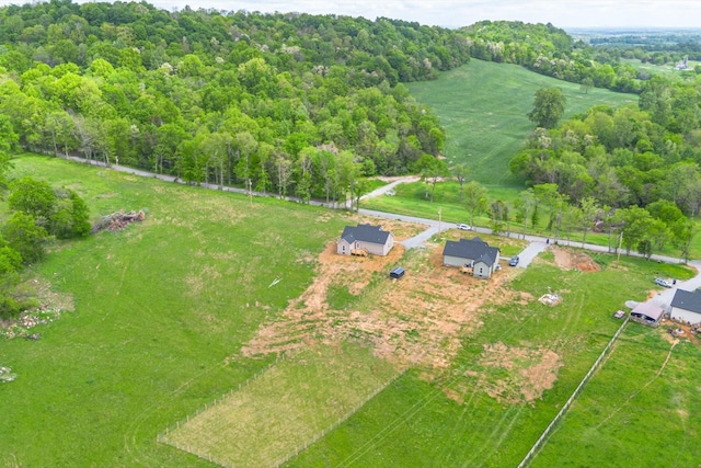 birds eye view of property featuring a rural view