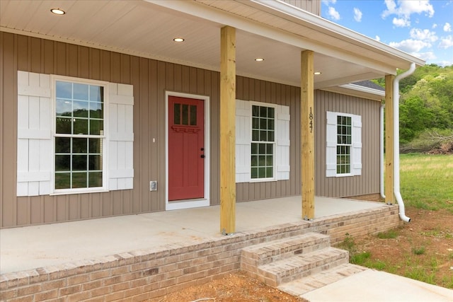 doorway to property with a porch