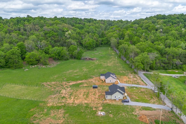 aerial view with a rural view and a view of trees