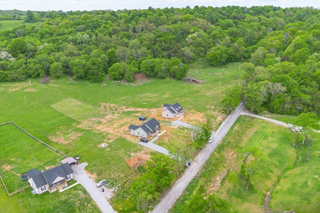 drone / aerial view with a rural view and a view of trees