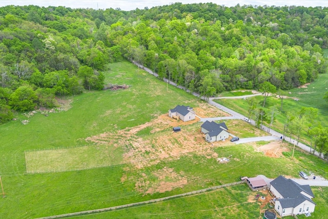 bird's eye view with a view of trees
