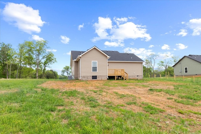 back of house featuring crawl space and a deck