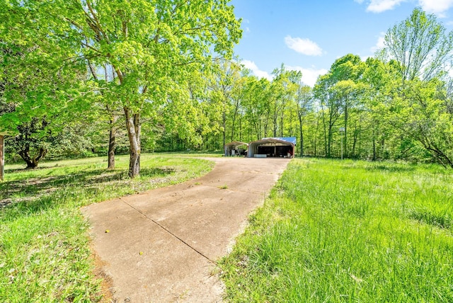 view of road featuring driveway