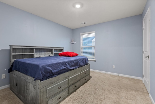 bedroom with baseboards, visible vents, and carpet flooring