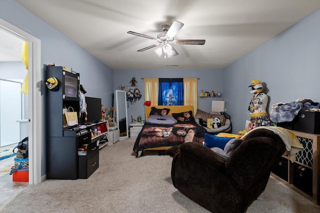 living room with a ceiling fan, carpet flooring, and visible vents