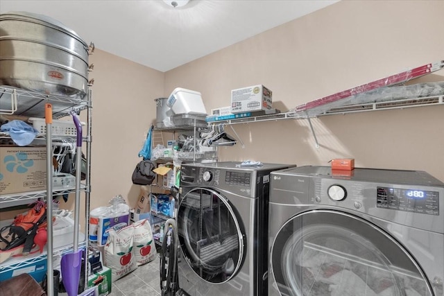 laundry room with washer and dryer and laundry area