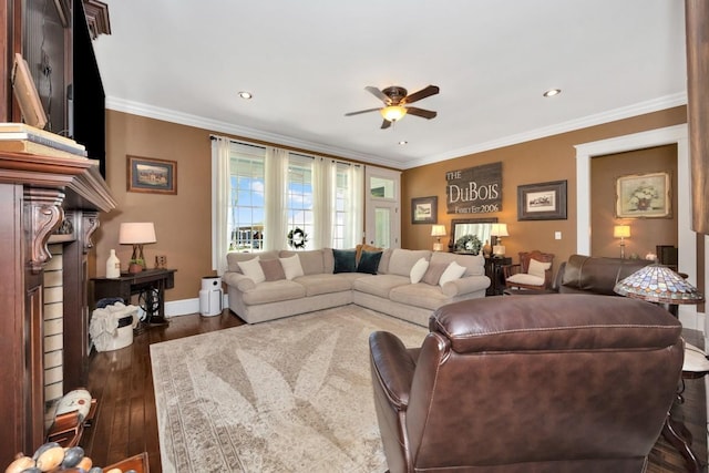 23475 Slate Rd, Athens, AL 35614 - living room featuring a ceiling fan, baseboards, dark wood-type flooring, and crown molding