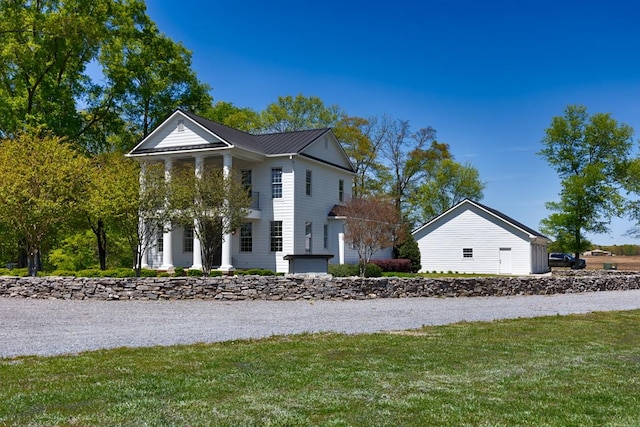 23475 Slate Rd, Athens, AL 35614 - neoclassical home featuring a front lawn and metal roof