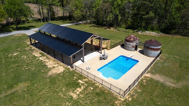 23475 Slate Rd, Athens, AL 35614 - view of pool featuring fence, a fenced in pool, a fire pit, and a yard