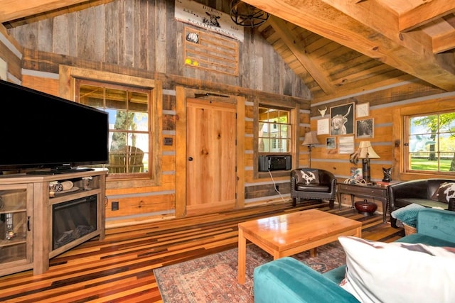 23475 Slate Rd, Athens, AL 35614 - living area with high vaulted ceiling, wood finished floors, wood ceiling, beamed ceiling, and wood walls