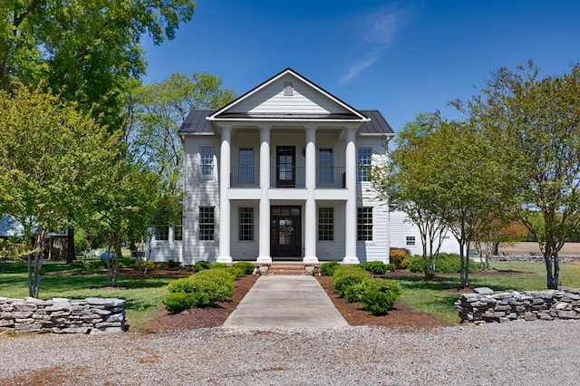 23475 Slate Rd, Athens, AL 35614 - greek revival inspired property featuring covered porch, a standing seam roof, and metal roof