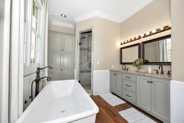 23475 Slate Rd, Athens, AL 35614 - bathroom featuring a stall shower, a freestanding tub, a sink, and crown molding