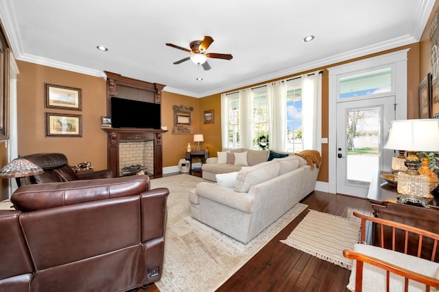 23475 Slate Rd, Athens, AL 35614 - living area with baseboards, a fireplace, ceiling fan, and a healthy amount of sunlight