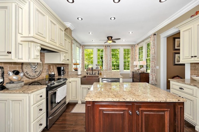 23475 Slate Rd, Athens, AL 35614 - kitchen featuring a ceiling fan, a center island, a sink, appliances with stainless steel finishes, and dark wood-style floors