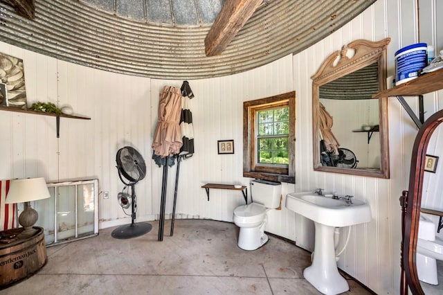 23475 Slate Rd, Athens, AL 35614 - bathroom featuring concrete flooring and toilet