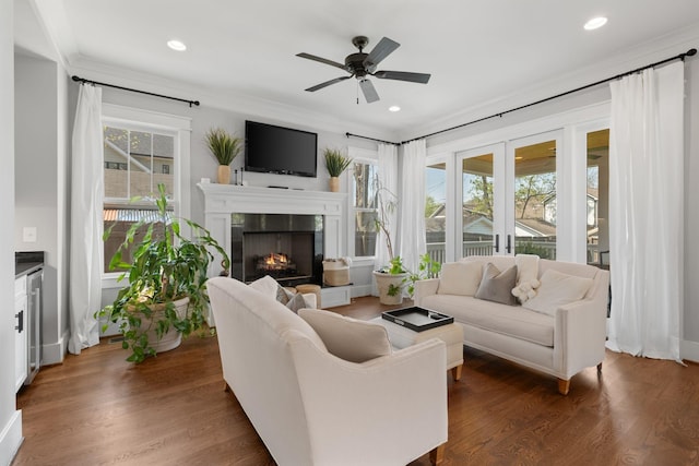 4306 Idaho Ave, Nashville, TN 37209 - living room with a lit fireplace, plenty of natural light, a ceiling fan, and ornamental molding