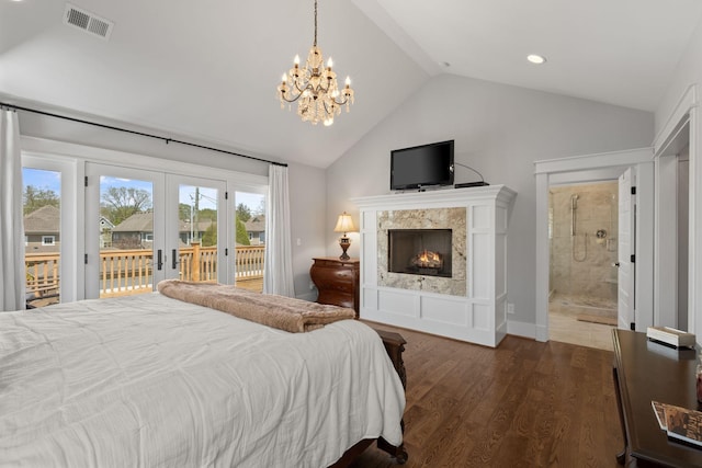 4306 Idaho Ave, Nashville, TN 37209 - bedroom featuring dark wood finished floors, visible vents, a fireplace, access to outside, and a notable chandelier