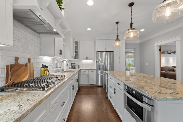 4306 Idaho Ave, Nashville, TN 37209 - kitchen with decorative backsplash, appliances with stainless steel finishes, white cabinetry, and recessed lighting