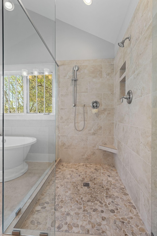 4306 Idaho Ave, Nashville, TN 37209 - bathroom featuring vaulted ceiling, a freestanding tub, recessed lighting, and a shower stall