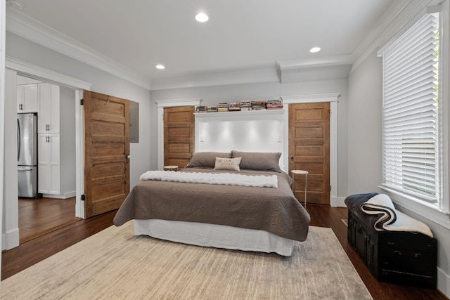 4306 Idaho Ave, Nashville, TN 37209 - bedroom with recessed lighting, ornamental molding, dark wood-style floors, and freestanding refrigerator