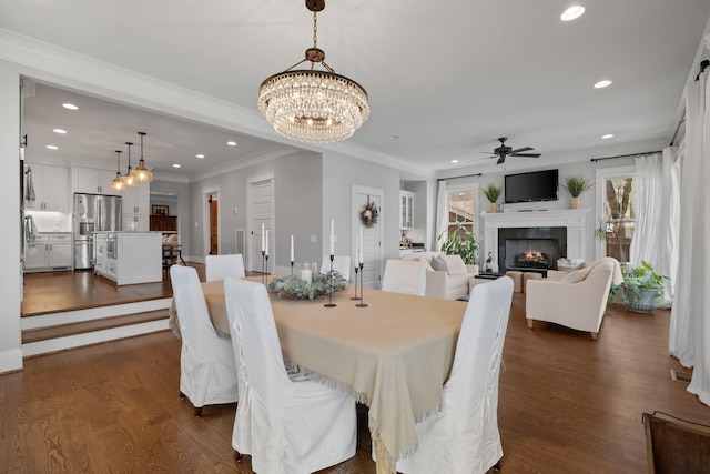 4306 Idaho Ave, Nashville, TN 37209 - dining area featuring recessed lighting, dark wood finished floors, crown molding, and ceiling fan with notable chandelier