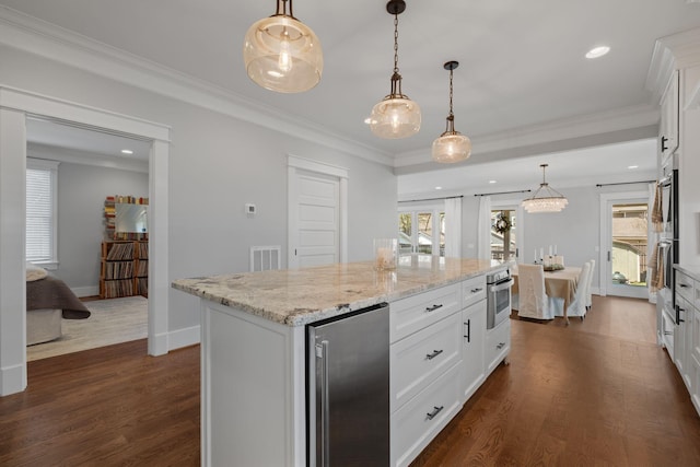 4306 Idaho Ave, Nashville, TN 37209 - kitchen with a wealth of natural light, white cabinetry, and dark wood-type flooring