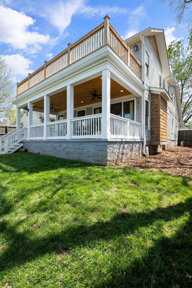 4306 Idaho Ave, Nashville, TN 37209 - view of front of property featuring a front lawn, a ceiling fan, and a balcony