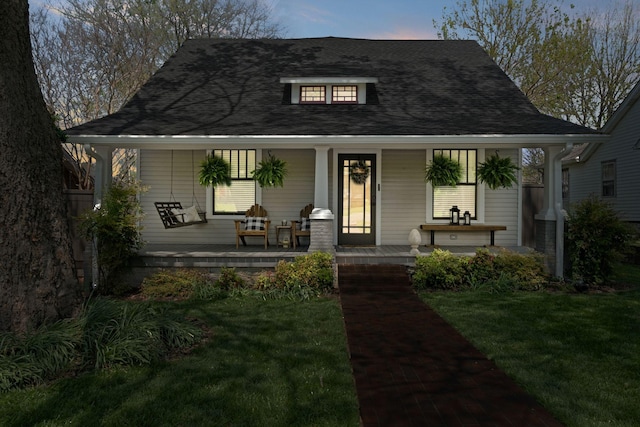 4306 Idaho Ave, Nashville, TN 37209 - view of front of house with a front yard and covered porch