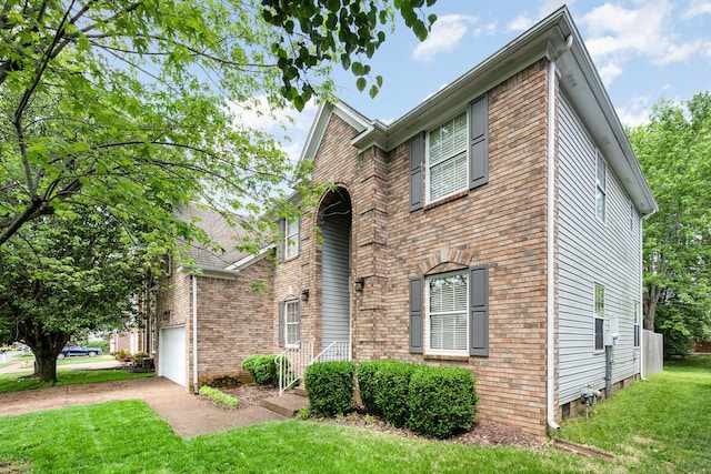 view of front of home with dirt driveway, a front yard, and brick siding