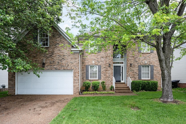 view of front of house featuring concrete driveway, a front yard, an attached garage, and brick siding