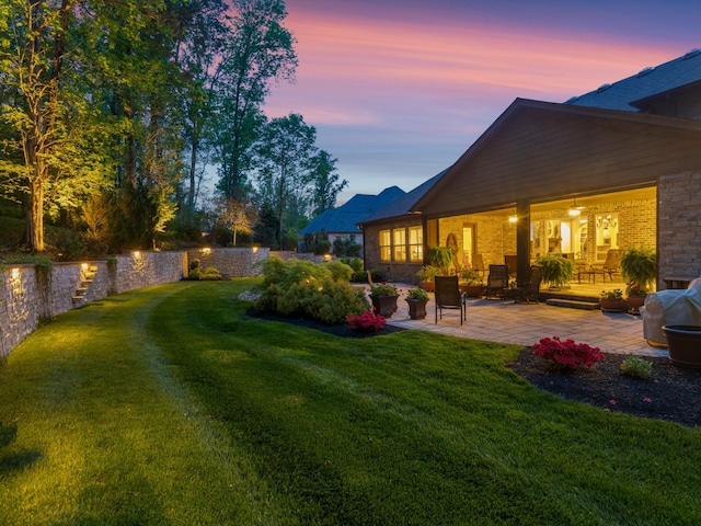 1320 Ashby Valley Ln, Arrington, TN 37014 - yard at dusk featuring fence and a patio