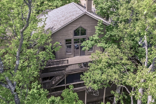 635 Harpeth Trace Dr, Nashville, TN 37221 - rear view of property featuring a wooden deck, a chimney, and stairs