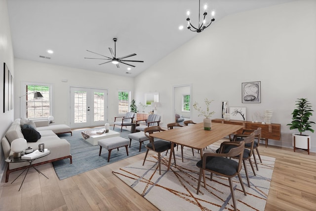 4151 Southside Rd, Southside, TN 37171 - dining area featuring visible vents, high vaulted ceiling, ceiling fan with notable chandelier, light wood finished floors, and recessed lighting