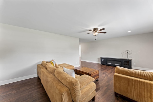 living area featuring baseboards, a ceiling fan, recessed lighting, and hardwood / wood-style flooring