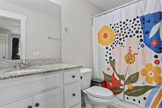 full bathroom with vanity, a shower with curtain, and toilet