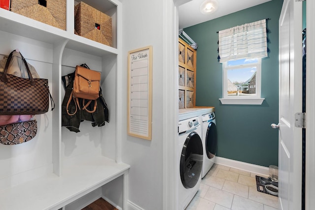 7025 Bennett Dr, Mount Juliet, TN 37122 - washroom with light tile patterned floors, washing machine and clothes dryer, baseboards, and laundry area