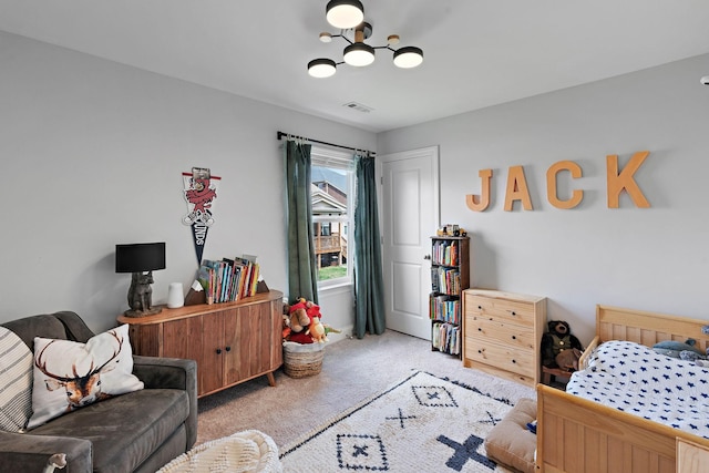 7025 Bennett Dr, Mount Juliet, TN 37122 - bedroom with light colored carpet, a notable chandelier, and visible vents