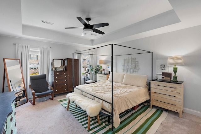 7025 Bennett Dr, Mount Juliet, TN 37122 - bedroom with visible vents, baseboards, light colored carpet, and a raised ceiling