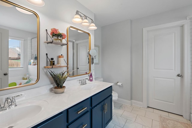 7025 Bennett Dr, Mount Juliet, TN 37122 - bathroom with marble finish floor, double vanity, toilet, and a sink