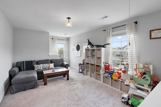 7025 Bennett Dr, Mount Juliet, TN 37122 - living area with baseboards, visible vents, and carpet flooring