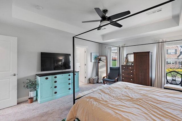 7025 Bennett Dr, Mount Juliet, TN 37122 - bedroom featuring a ceiling fan, carpet floors, a tray ceiling, baseboards, and visible vents