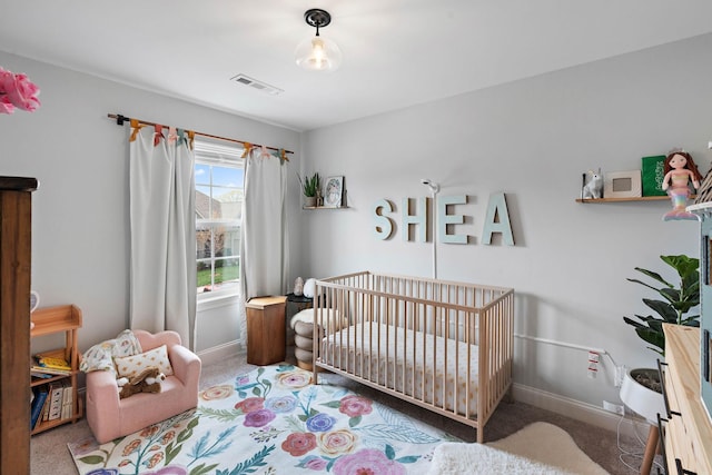 7025 Bennett Dr, Mount Juliet, TN 37122 - carpeted bedroom featuring a nursery area, visible vents, and baseboards