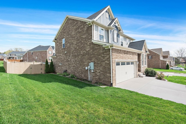 7025 Bennett Dr, Mount Juliet, TN 37122 - view of side of property with concrete driveway, a lawn, fence, a garage, and a residential view