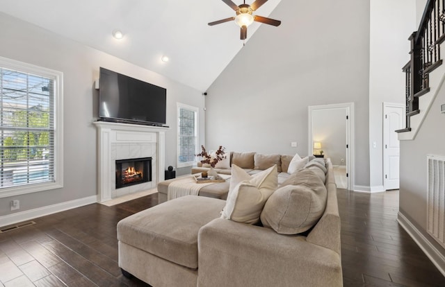 124 Houghland St, Gallatin, TN 37066 - living area with high vaulted ceiling, baseboards, a ceiling fan, and a fireplace