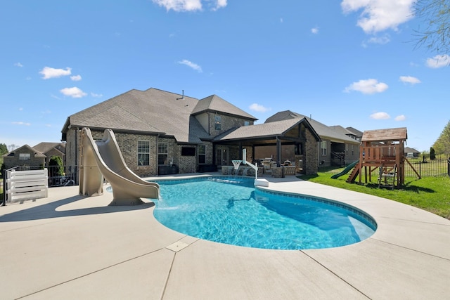 124 Houghland St, Gallatin, TN 37066 - view of swimming pool with a fenced in pool, a water slide, a playground, fence, and a patio