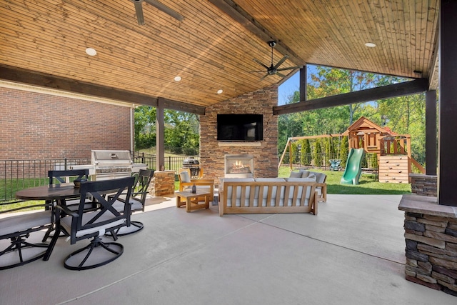 124 Houghland St, Gallatin, TN 37066 - view of patio / terrace featuring an outdoor living space with a fireplace, fence, a ceiling fan, grilling area, and area for grilling