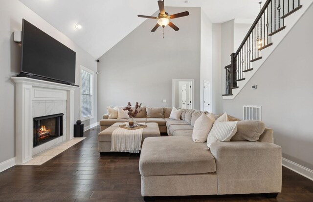 124 Houghland St, Gallatin, TN 37066 - living area with hardwood / wood-style floors, visible vents, baseboards, high vaulted ceiling, and ceiling fan