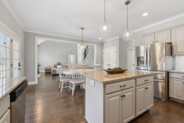 124 Houghland St, Gallatin, TN 37066 - kitchen with crown molding, appliances with stainless steel finishes, dark wood-type flooring, and recessed lighting