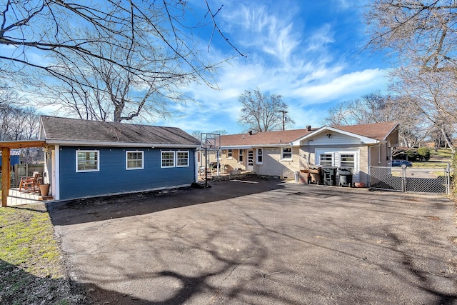 474 Sunliner Dr, Nashville, TN 37209 - back of house featuring fence and driveway